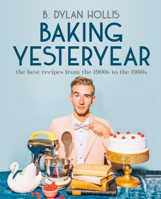 Cover of Baking Yesteryear: Photo of author B. Dlyan Hollis in front of cake on a cake stand