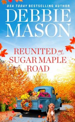 Cover of Reunited on Sugar Maple Road: Old blue truck driving down road with fall leaves