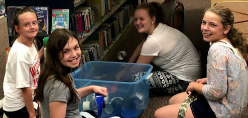 teens preparing to build a fort during a teen event