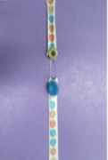 elastic book mark made of ribbon and buttons